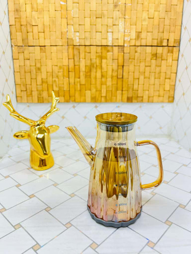 روغن ریز پیرکس ضخیم درب استیل دسته طلایی طرح گلدار طلایی حجم 800 میل